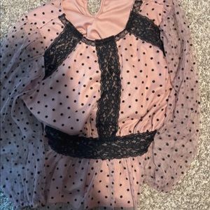 Pink and black polkadot blouse